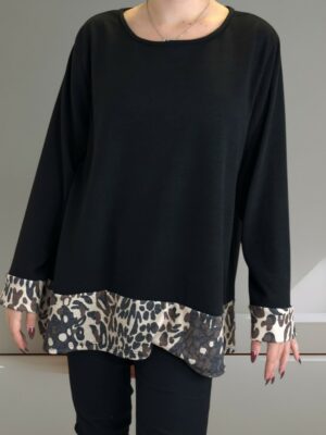 Μπλούζα με φαρδιά φάσα στο τελείωμα