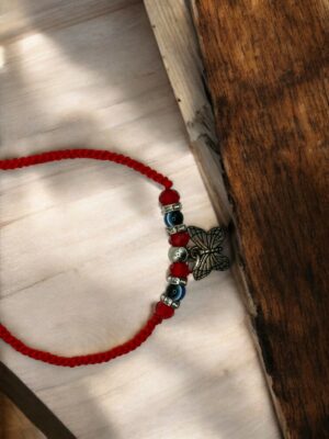 Βραχιόλι Πεταλούδα με κορδόνι κόκκινο