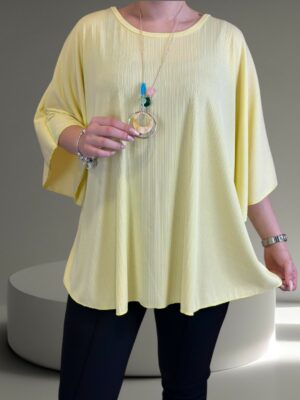 Η ribbed μπλούζα που αγκαλιάζει τη σιλουέτα