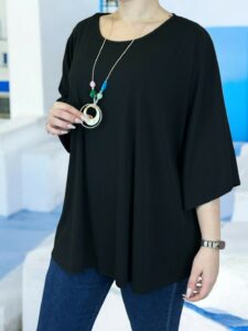 Η ribbed μπλούζα που αγκαλιάζει τη σιλουέτα