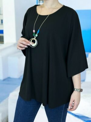 Η ribbed μπλούζα που αγκαλιάζει τη σιλουέτα