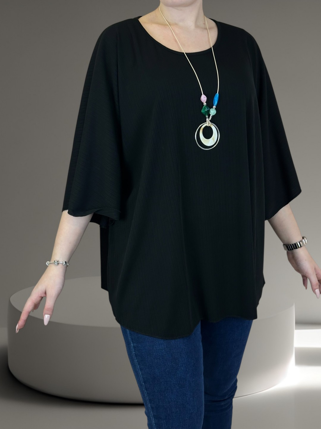 Η ribbed μπλούζα που αγκαλιάζει τη σιλουέτα