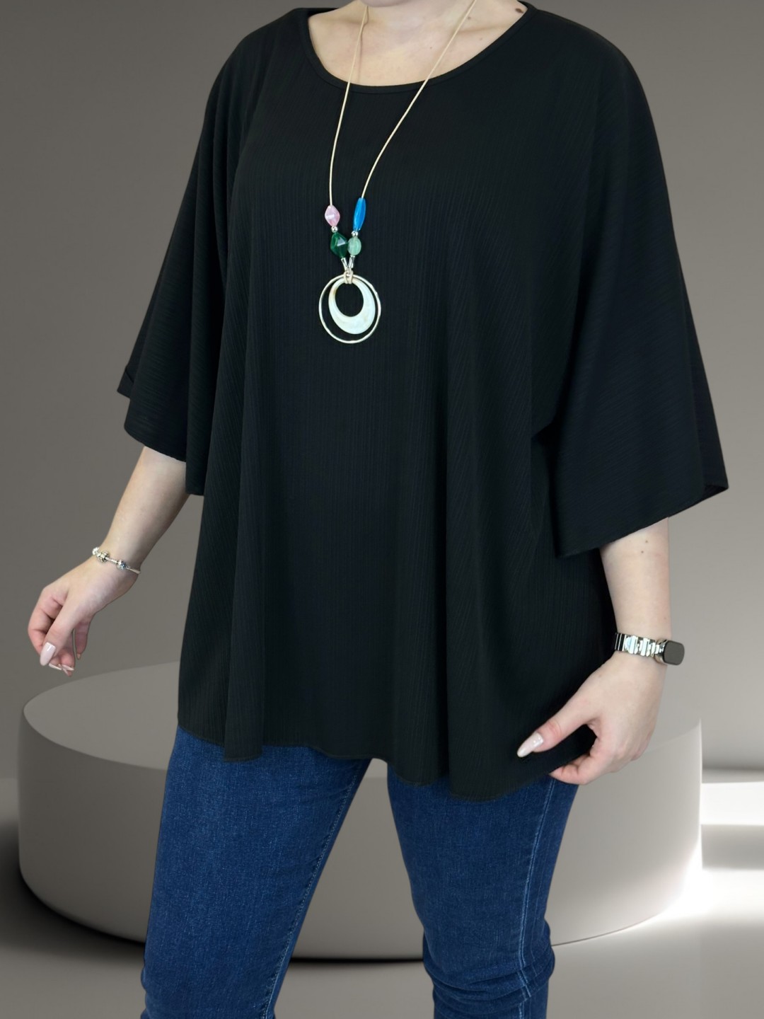 Η ribbed μπλούζα που αγκαλιάζει τη σιλουέτα