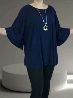 Η ribbed μπλούζα που αγκαλιάζει τη σιλουέτα