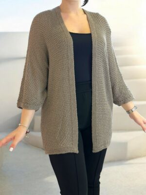 Η πορτοκαλί πλεκτή ζακέτα που φωτίζει το look