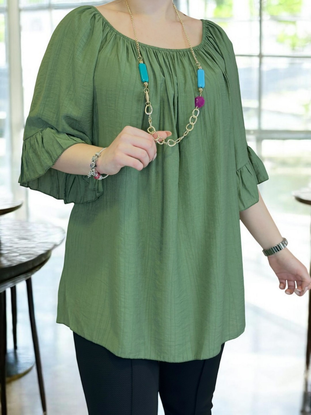 Elegant μπλούζα με βολάν λεπτομέρεια