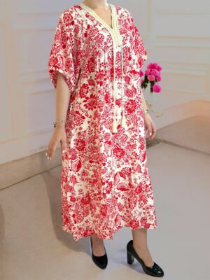 Αέρινο μάξι φόρεμα με φουντίτσες