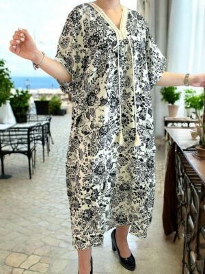 Αέρινο μάξι φόρεμα με φουντίτσες