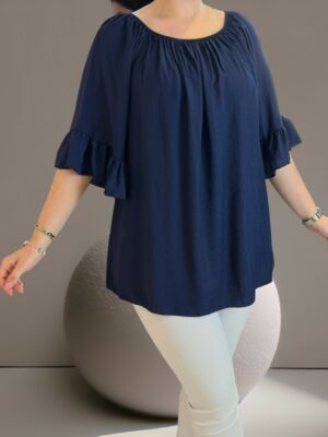 Elegant μπλούζα με βολάν λεπτομέρεια