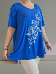 Άνετη ελαστική μπλούζα με λουλουδάτη στάμπα