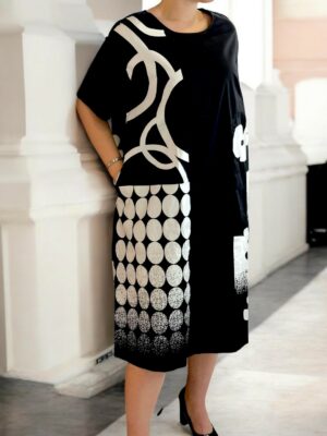 Κομψό ασπρόμαυρο φόρεμα με ιδιαίτερη υφή