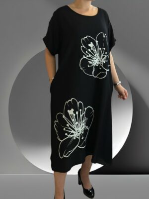 Elegant φόρεμα με εντυπωσιακά floral μοτίβα