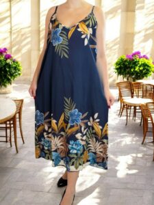 Κομψό τιραντέ φόρεμα με εντυπωσιακό floral print